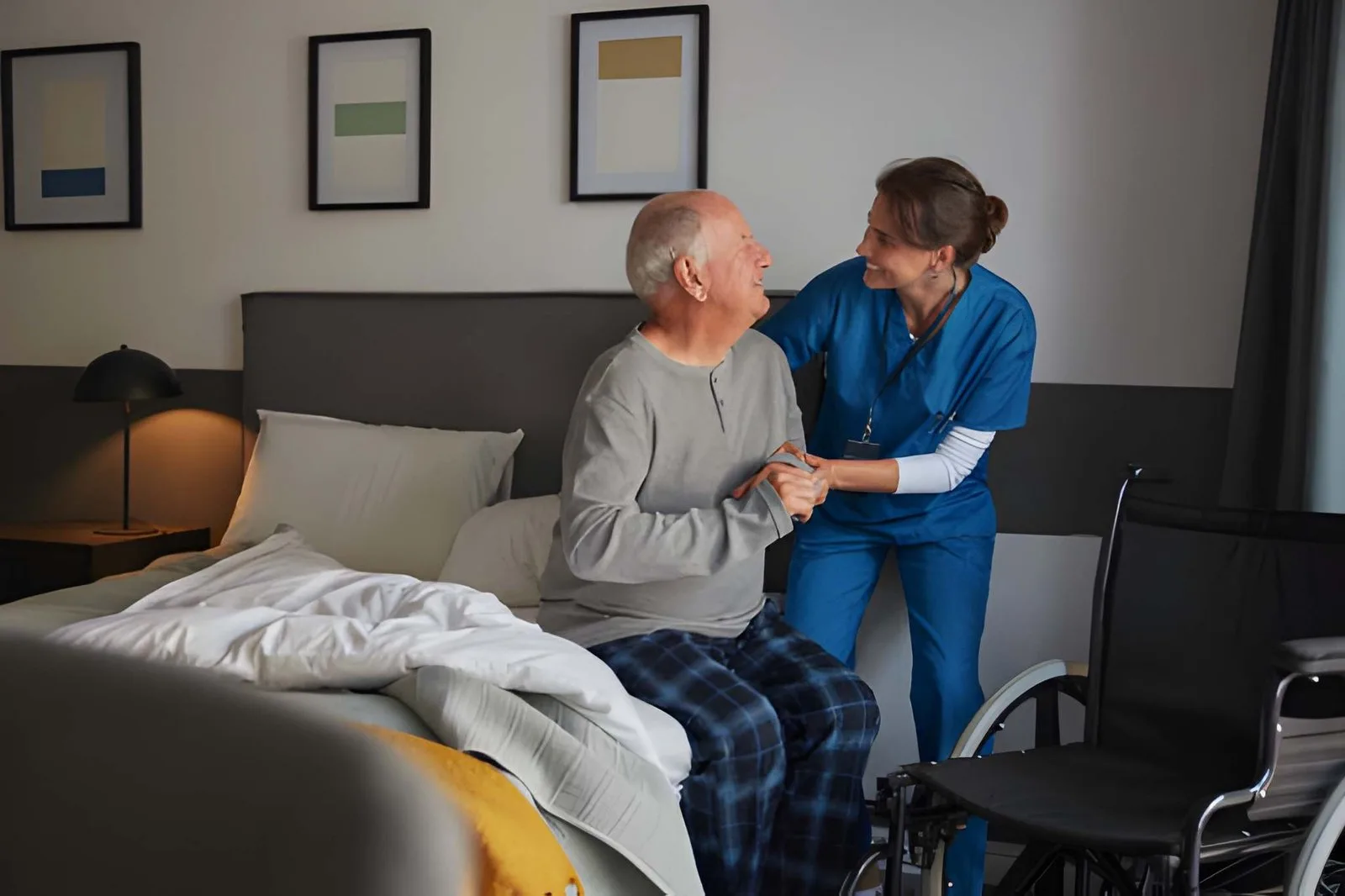 Care professional providing attentive bedside support