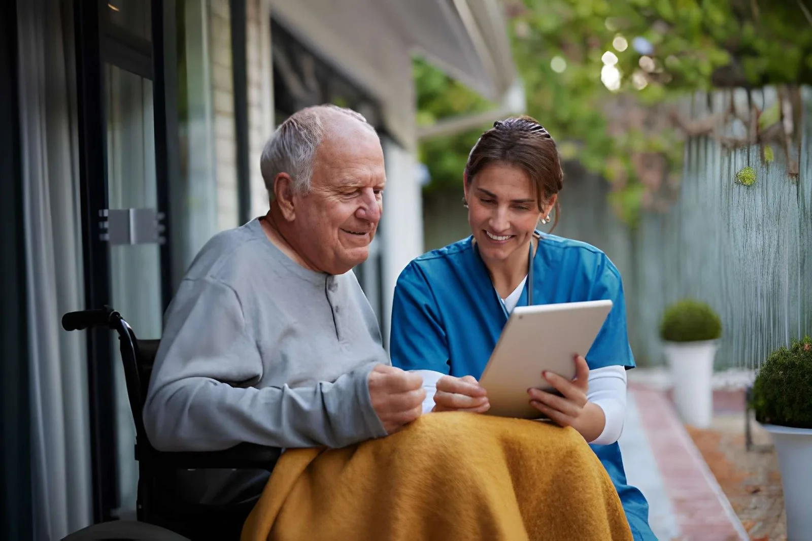 Caregiver reviewing information with an older adult